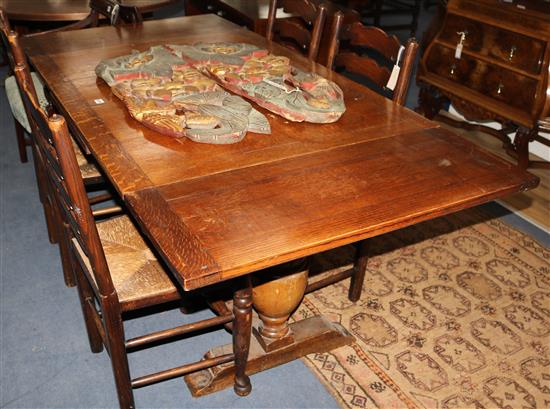 A 1920s oak draw leaf dining table, extends 182 x 89cm